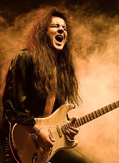 Holding the Guitar - Yngwie Malmsteen