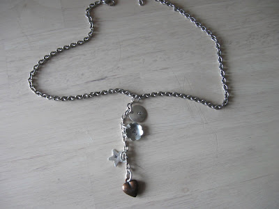 Necklace with flowers and a heart