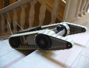 Design and Implementation of a Stair-Climbing Robot