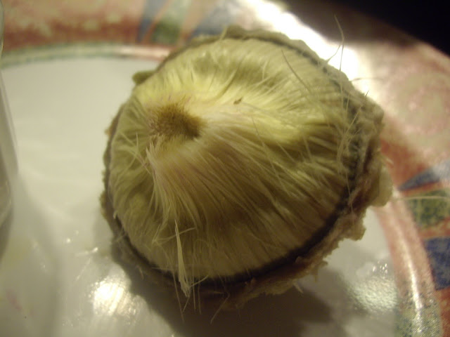 A cooked artichoke heart. 