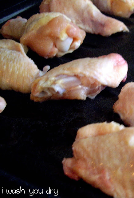 Close up of uncooked chicken wings. 