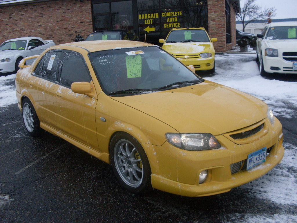 Luisrideauto 2003 Mazda Portage Speed 4 Door Sedan 2 0