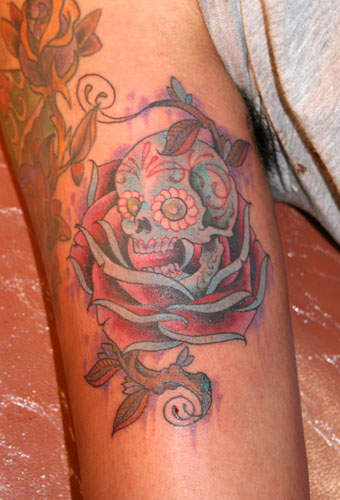Rose Tattoos The beauty of a rose cannot be described enough with man made