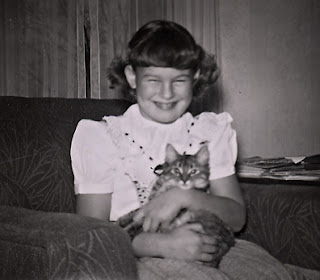 Robin Atkins and her first cat, Tippy; 1951