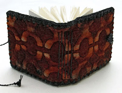 handmade book by Chad Alice Hagen, hand bound, resist-dyed felt cover