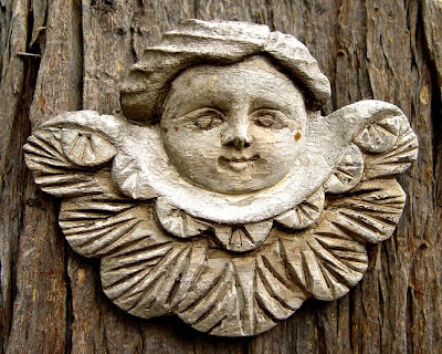 wooden angel sculpture