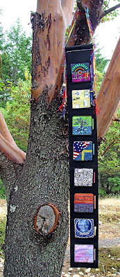 bead journal project, banner hanging from tree