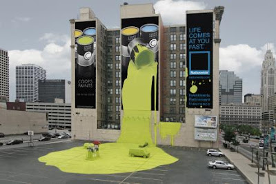 Acidente com carro imagem de uma lata de tintas gigante derramada sobre um prédio e carros