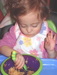 [2006.02.04HollandFeedingSelf.jpg]