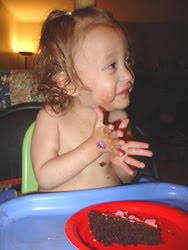 [2006.08.18HollyClappingCake.jpg]