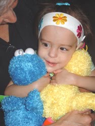 [2006.08.18EdenHuggingBabies.jpg]