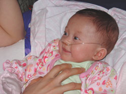 [2005.2.12DaddyTicklingHolly.jpg]