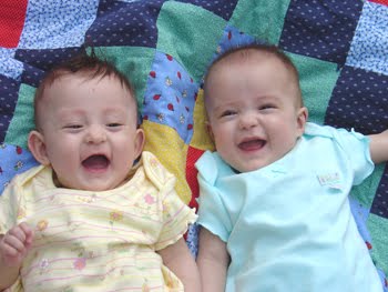 [2005.05.09LaughingonQuilt.jpg]