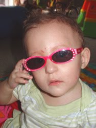 [2005.09.18HollySunglassesSerious.jpg]