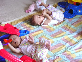 [2005.08.23H&EPlayingonFloor.jpg]