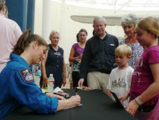 NASA Astronaut Tracy Caldwell signs autographs at the San Diego Air & Space Museum