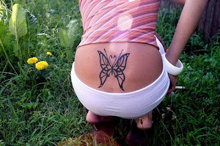 girly butterfly tattoo