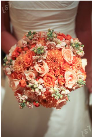 Orange and pink roses wedding bouquet mixed in with orange calla 