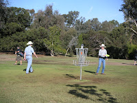 my two cowboys playing disc golf