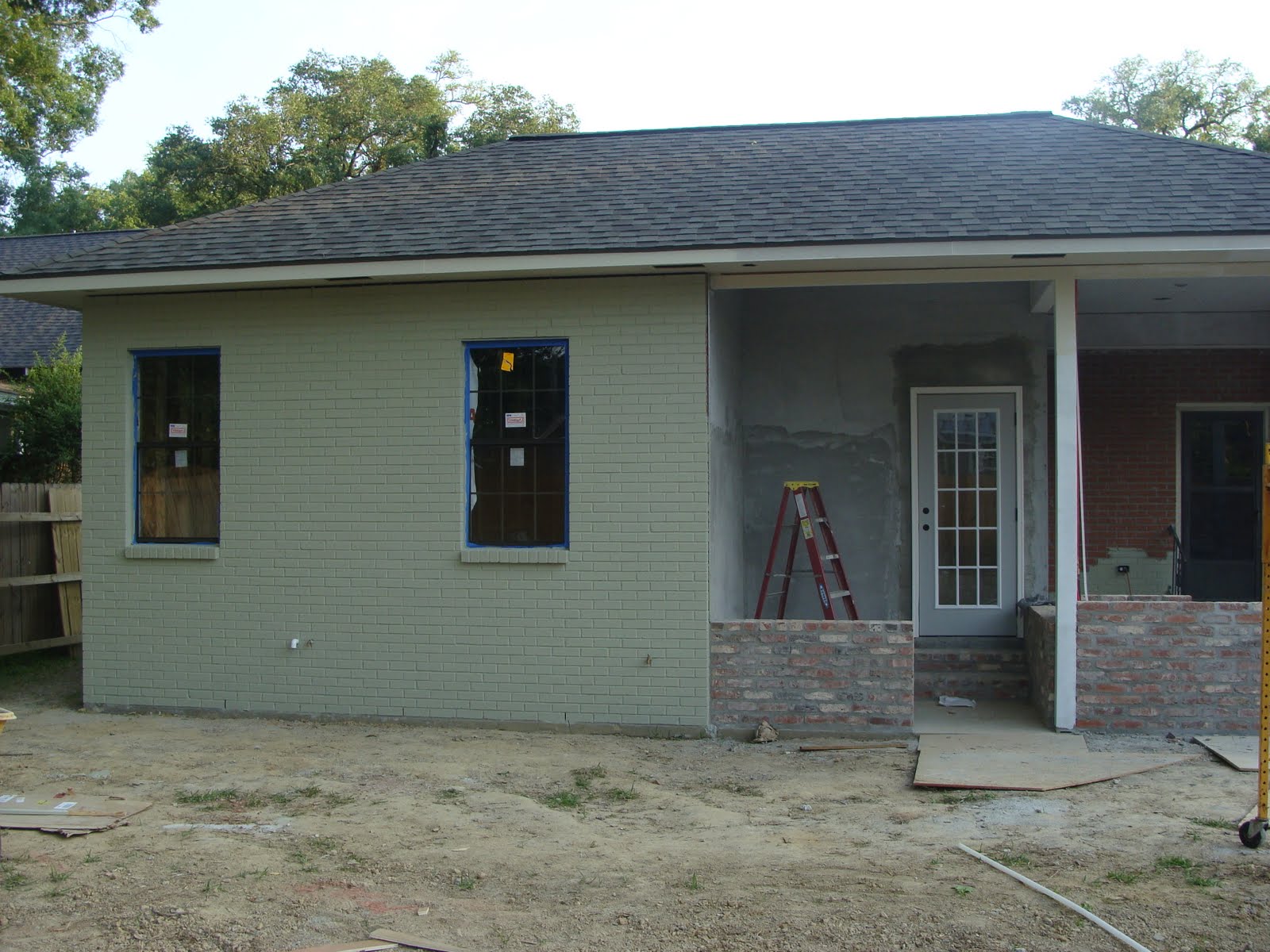 The Ross' Painted brick, outdoor kitchen, backdoor...YEAH!