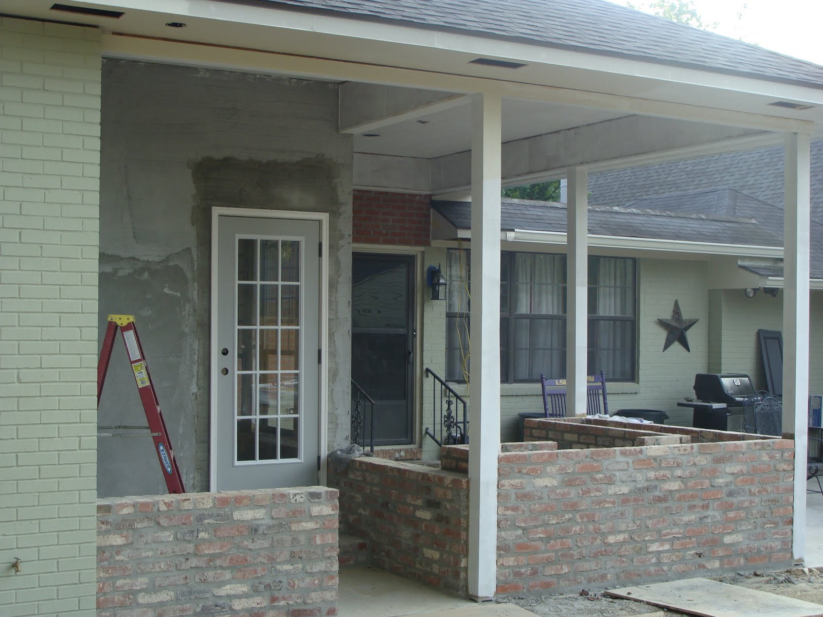 The Ross' Painted brick, outdoor kitchen, backdoor...YEAH!