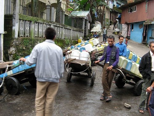 [Darjeeling+suffers+from+a+water+problem.+These+men+distribute+and+sell+water+home+to+home.jpg]