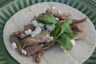 Juicy pork carnitas tacos are simply made in a crockpot with just a few ingredients that everyone has on hand and they turn out perfect every time! ohsweetbasil.com Juicy pork carnitas tacos are simply made in a crockpot with just a few ingredients that everyone has on hand and they turn out perfect every time! ohsweetbasil.com