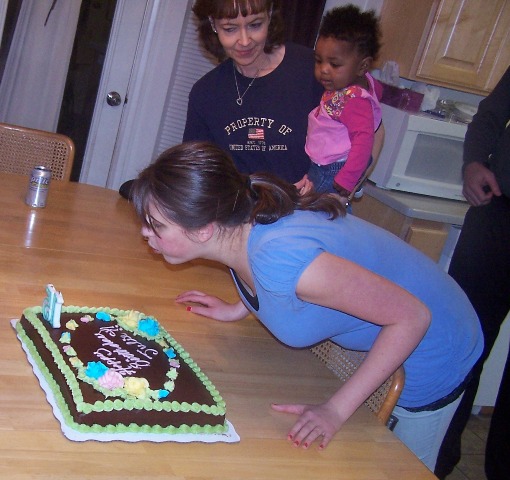 [Julie+blowing+out+candles+15th+birthday.jpg]