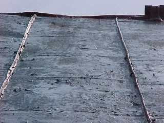 Early tin roof panels had horizontal seams every one to two feet