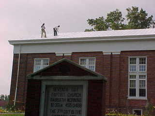 White roofing application over church in southern New Jersey