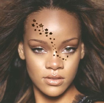Racy Rihanna twinkles with a tattoo of falling stars
