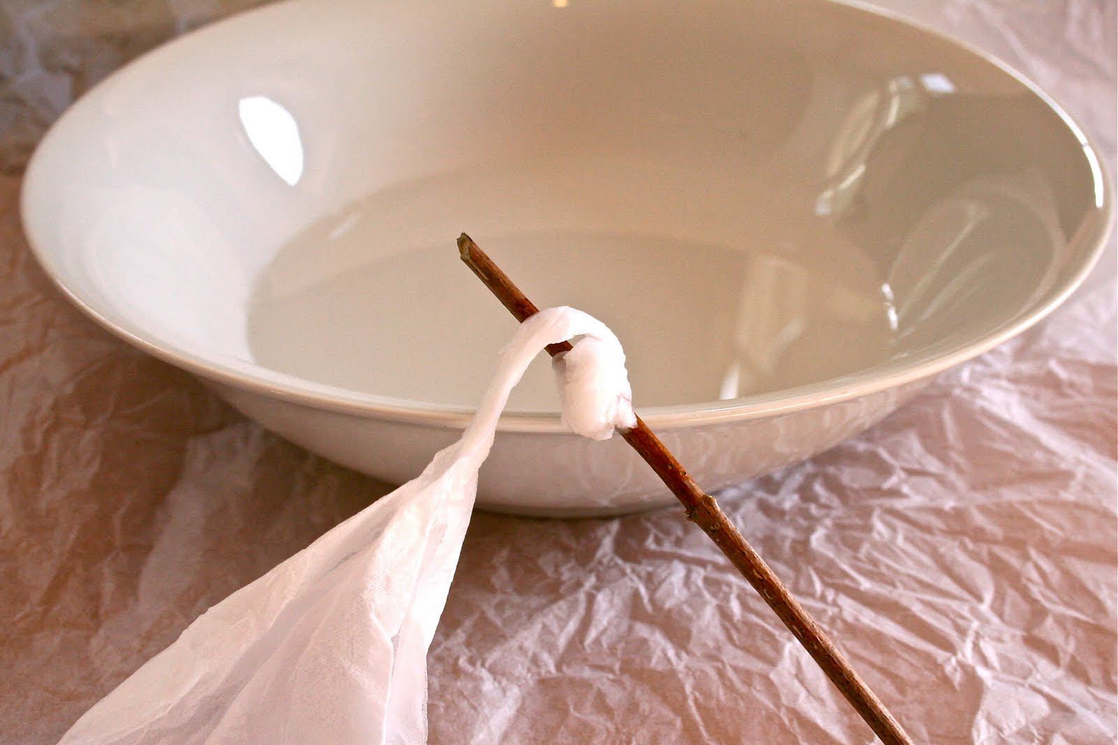 Hilary Bravo Making plain white papiermâché beads ready for decorating.