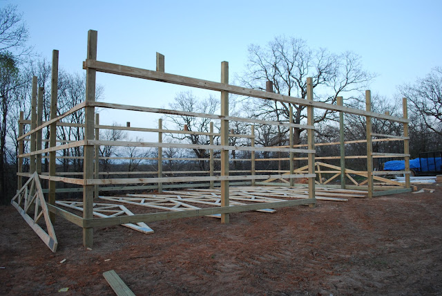 A half-built pole barn