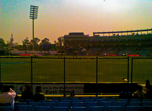 Mobile Clicks of IPL Match between Delhi DareDevils and Chennai Super Kings on 19th March 2010 @ Firoz Shah Kotla, Delhi, INDIA: Posted by VJ on PHOTO JOURNEY @ www.travellingcamera.com : VJ, ripple, Vijay Kumar Sharma, ripple4photography, Frozen Moments, photographs, Photography, ripple (VJ), VJ, Ripple (VJ) Photography, VJ-Photography, Capture Present for Future, Freeze Present for Future, ripple (VJ) Photographs , VJ Photographs, Ripple (VJ) Photography : I don't follow cricket and but know few players who have big name in the world of Cricket. On Friday we had an office outing to Firoz Shah Kotla to watch IPL Match between Delhi DareDevils and Chennai SuperKings...Cameras were not allowed inside the stadium :(  But I managed with my Nokia Phone :): This Stadium was originally a fortress built by Sultan Ferozshah Tughlaq to house his version of Delhi city called Ferozabad. A pristine polished sandstone pillar from the 3rd century B.C. rises from the palace's crumbling remains, one of many pillars left by the Mauryan emperor Ashoka; it was moved from Punjab and re-erected in its current location in 1356. The Feroz Shah Kotla was established as a cricket ground in 1883. The first test match at this venue was played on November 10, 1948 when India took on the West Indies. Anil Kumble took 10 wickets in an inning on this ground in 1999, only the second time this feat has been achieved in test cricket. It is owned and operated by the DDCA (Delhi District Cricket Association). Since 2008 the stadium has been the home venue of the Delhi DareDevils of the Indian Premier League. On 27th December 2009, an ODI match between India and Sri Lanka called off because pitch conditions were classed as unfit to host a match. The ICC is currently conducting an investigation, and a possible sanction could include the Feroz Shah Kotla being rejected as a venue for the 2011 Cricket World Cup. : Sunset colors in the background of Firoz Shah Kotla...