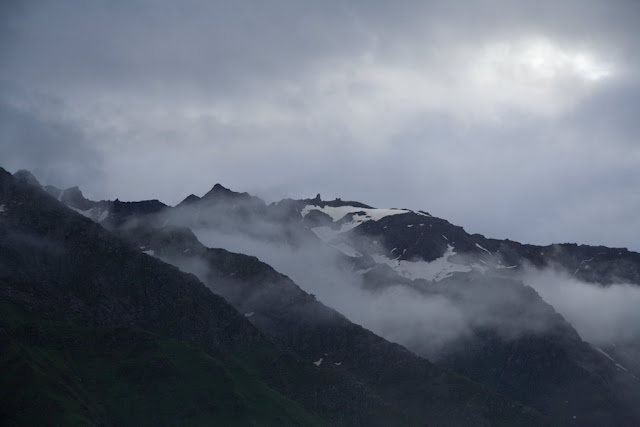 Posted by Ripple (VJ) : Shrikhand Mahadev Yatra SHRIKHAND MAHADEV TREKKING: View of Shrikhand Mahadev from Kaali Ghati: Shrikhand shivalingam can be clearly seen from Kaali ghati before 7:30 am. After that clouds cover the whole area and visibility radius reduces to 15  meters. 