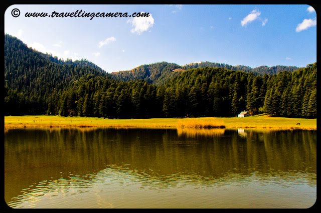 When you get your first glimpse of Khajjiar, it is a shock to senses. One does not expect to come across a huge expanse of green grassland right in the middle of steep hills and mountains. Once you get over the shock, it is a pleasant sight. The lush green grassland surrounded by petite cottages and magnificient deodars is very soothing to the eyes. Almost like a painting.khajjiar, Himachal Pradesh, Hills, himalayas, Lakes, Water, Horses