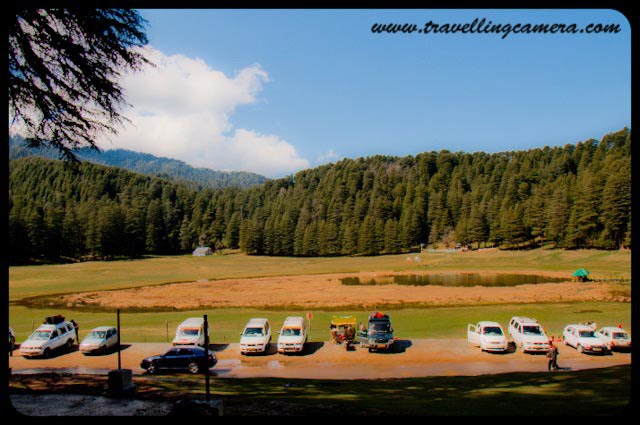HPPWD Guest House @ Mini Switzerland of Himachal Pradesh, INDIA : Posted by VJ Sharma @ www.travellingcamera.com : Khajjiar in Chamba District of Himachal Pradesh is known as mini Switzerland of India. Its a beautiful place between Deodar Forests.. A lake on hill top with a splendid view of snow capped hills looks amazing... Khajjiar is just 25 kilometers from Dalhousie and one must go here if planned for Dalhousie or Chamba...A view of Khajjiar Lake from HPPWD Guest House.... For more details about Khajjiar, check out http://hpchamba.nic.in/destkhajjiar.htm Another photograph of Mini Switzerland from HPPWD guest house...HPPWD Guest House @ Khajjiar, Chamba, Himachal Pradesh...Its situated on one edge of Khajjiar Lake and gives amazing view of lake... All the photographs of Khajjiar lake shared in this post have been clicked form this guest House...CLICK on below mentioned links to see more photographs of Dalhousie region in Himachal Pradesh.... Click Here to see snowfall photographs in Dalhousie: My first Rendevous with SnowClick Here to see colorful birds @ Dalhousie ChurchClick here to feel Dalhousie An inetersting and one of the best Hill stations in Himachal PradeshClick here to see Photographs of Mesmerizing Khajjiar Click Here to see beautiful Ravi River near Dalhousie @ Chamba, Himachal Pradesh Click Here to see photographs of Colorful ChambaClick here to see Snow-Covered Peaks of Peer-Panjal Range @ Himachal PradeshClick Here to see Sunset @ Dalhousie, Himachal Pradesh