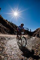 Full Day Break on fourth day of MTB Himachal 2010 - Kullu Sarahan : Posted by VJ SHARMA on www.travellingcamera.com : Its been more than two weeks that we are sharing a long journey of MTB Himachal 2010... Here comes the fourth day which was rest day for all the riders... I must say that Kullu Sarahan was the best choice to spend one complete day... Check out these photographs to know how the day was spent in a valley surrounded by snow capped mountains.Here is a view of our camp in the playground of government school at Kullu Sarahan... In the morning everyone of us was amazed by seeing the beauty around this place. During last night, no one was able to guess all this except the mountains with shining snow on the top. An early morning view with full moon sitting on top of snow covered hills.... These hills were just behind our tents and it was wonderful...Snow covered hills were not the only beauty of this place... There was a huge ground in the bottom of these hills and it was huggge... Khajjiar in Chamba region of himachal was coming in my mind while I saw it... What a wonderful schooling experience... Class in open area while taking sunbath in the huge ground in the bottom of snow capped mountains of Shrikhand ranges... Here some of the children having their class in Sarahan valley...Who wanted to miss this opportunity.. One of the MTB rider inspired by the school children and started cleaning his bike in the ground behind the school... I don't think I can explain this experience in words..Buggy standing in front of the mountains with partial sunlight... Its an early morning scene when rising sun was not visible but its effect made us realize that the process has started... This was the only day I saw some enthu among folks in the camp... Some of them were singing, few of them dancing and many of them were screaming... but full on masti !!!