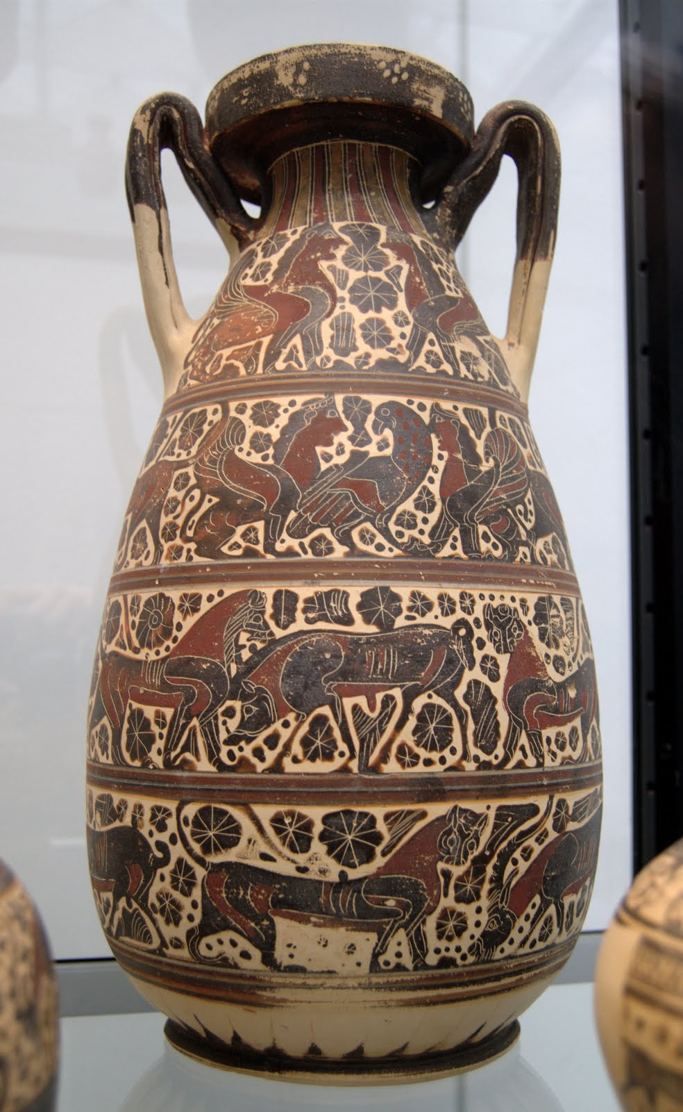 red and black greek pottery