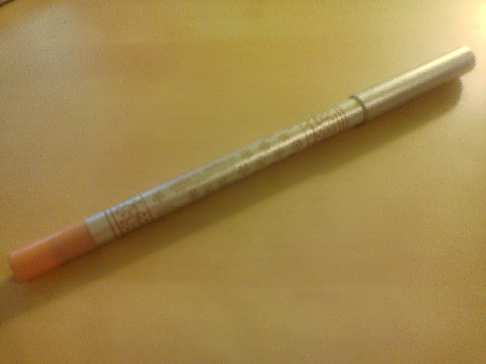 the simpleton Boujois DuoChrome Vert Dore (61) and Stila Kajal