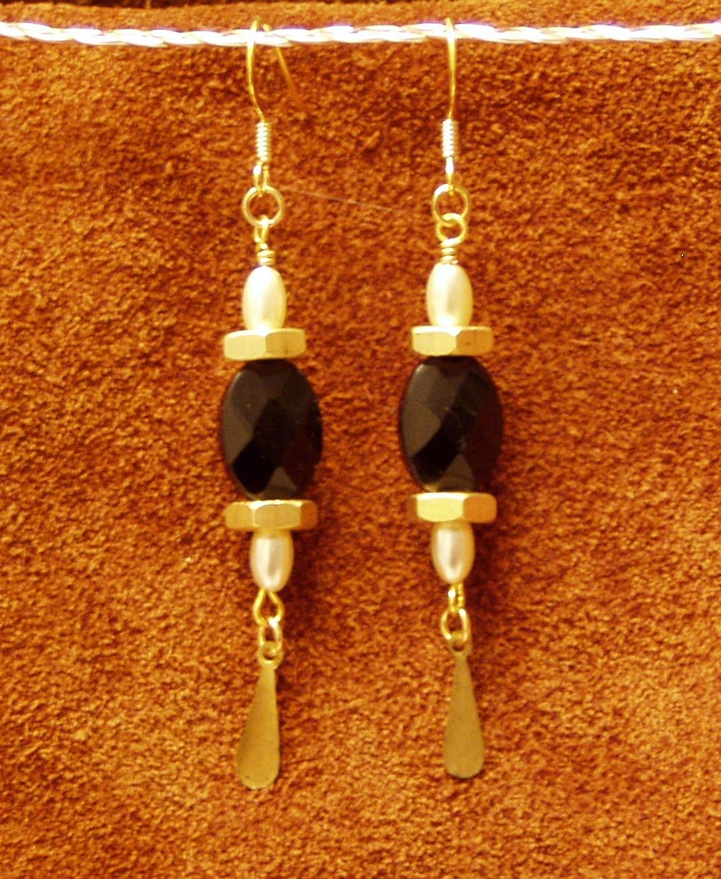 [black+bead+and+brass+nut+earrings.jpg]