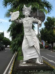A Legong Dancer Statue Lines a Balinese Auto Expressway