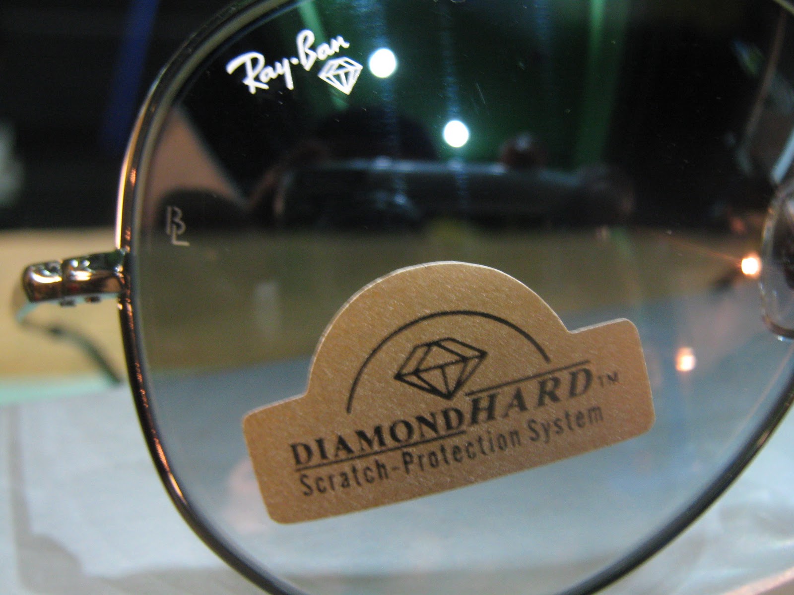 ray ban aviator with diamond logo