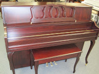 Older acoustic console piano Older acoustic console piano