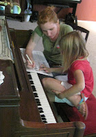 Arianna Fourt and young piano student