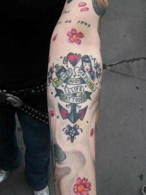 She offered up this tattoo on her left arm which is a modified version of a 