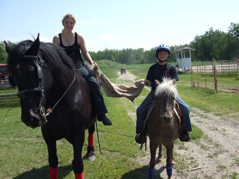 Hunter runiing Sack race allong side a ponie