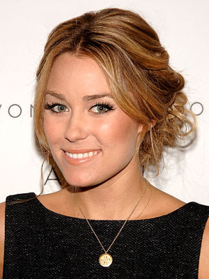 Lauren Conrad in an excellent back pose with her blonde prom hairstyle