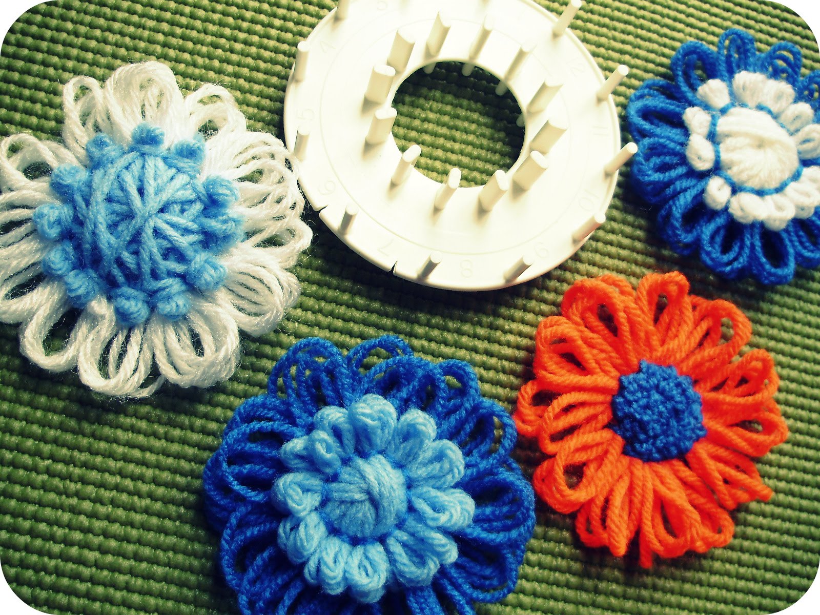 That is Charming Flower Looms & Granny Squares