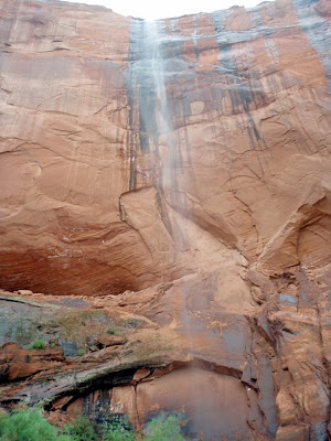 Lake Powell camping, red rock waterfall